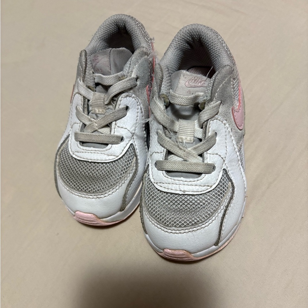Nike Gray and Pink Sneakers with Breathable Mesh and Supportive Midsole